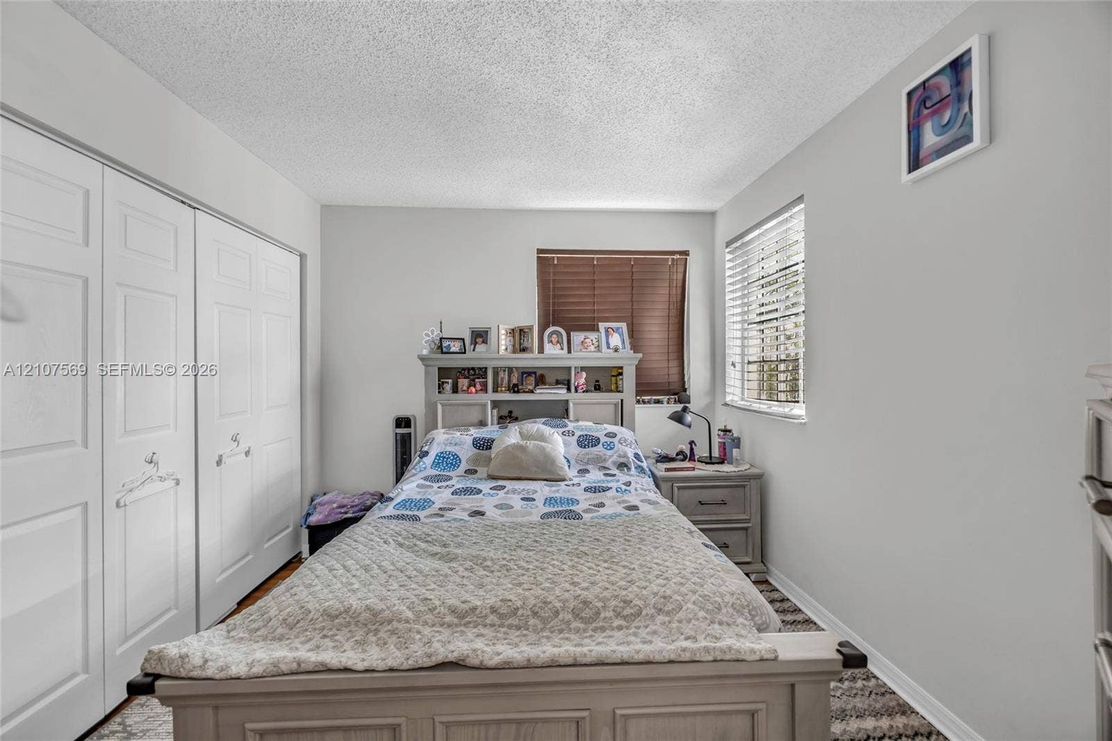3765 San Simeon Circle, #3765, Weston, Weston, FL 33331 Room featuring white paneled double-door closets and horizontal window blinds