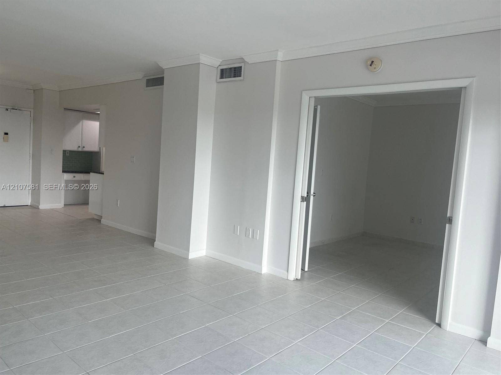 Tile flooring & crown molding throughout!
