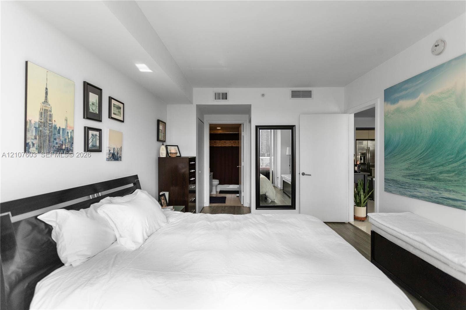 4250 Biscayne Boulevard, #1418, Miami, FL 33137 Room featuring neutral wall finishes, recessed lighting, and wood-finish flooring