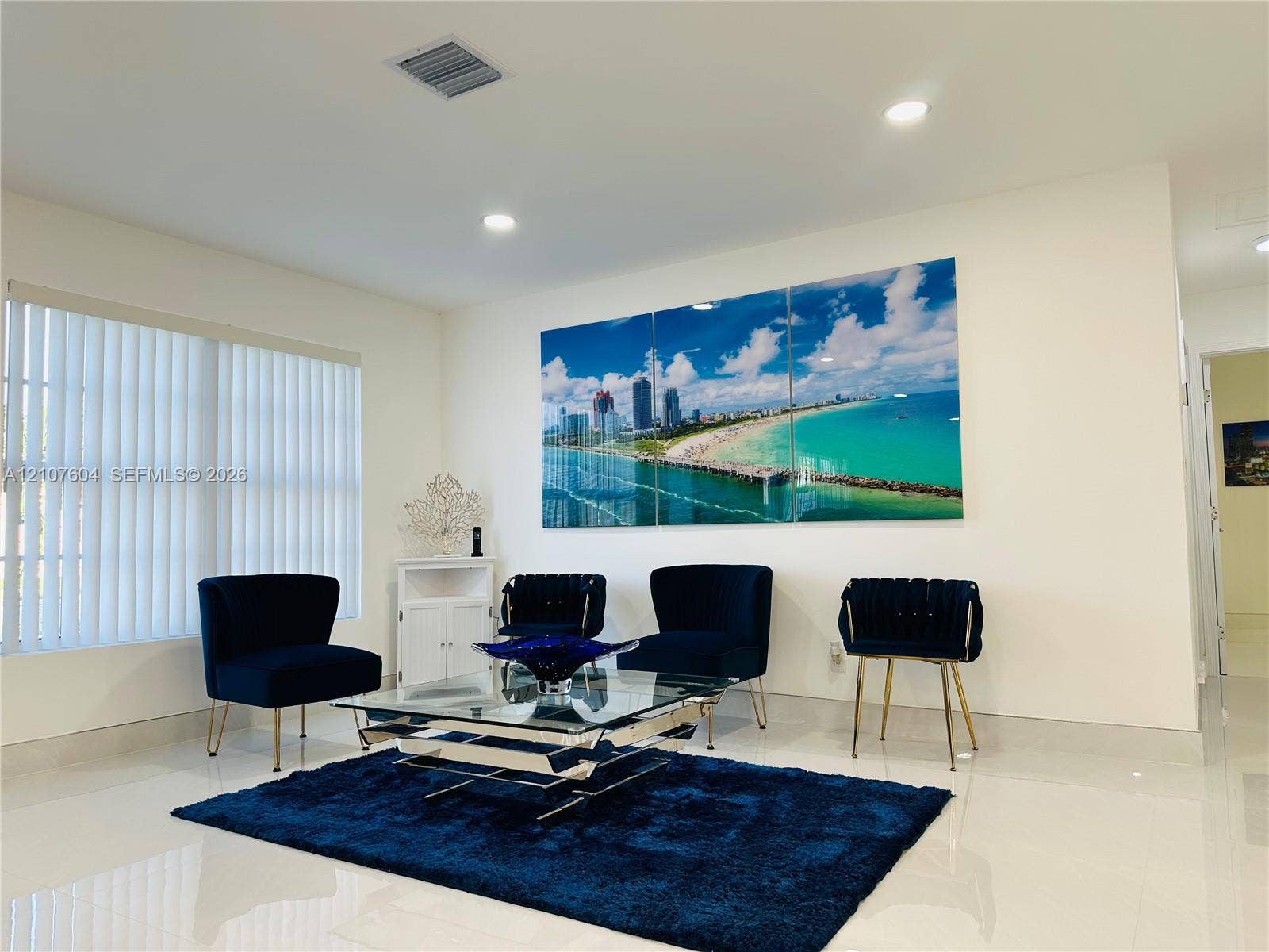 120 S 56th Avenue, Hollywood, Hollywood, FL 33023 Interior space featuring polished tile flooring, recessed lighting, and vertical window blinds