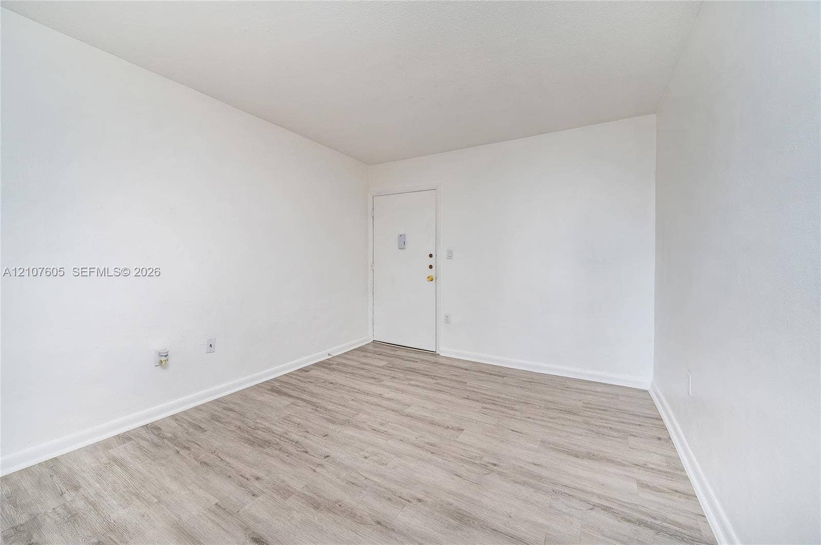 444 SW 27th Avenue, #42, Miami, Miami, FL 33135 Neutral interior featuring wood-finish flooring and stark white walls