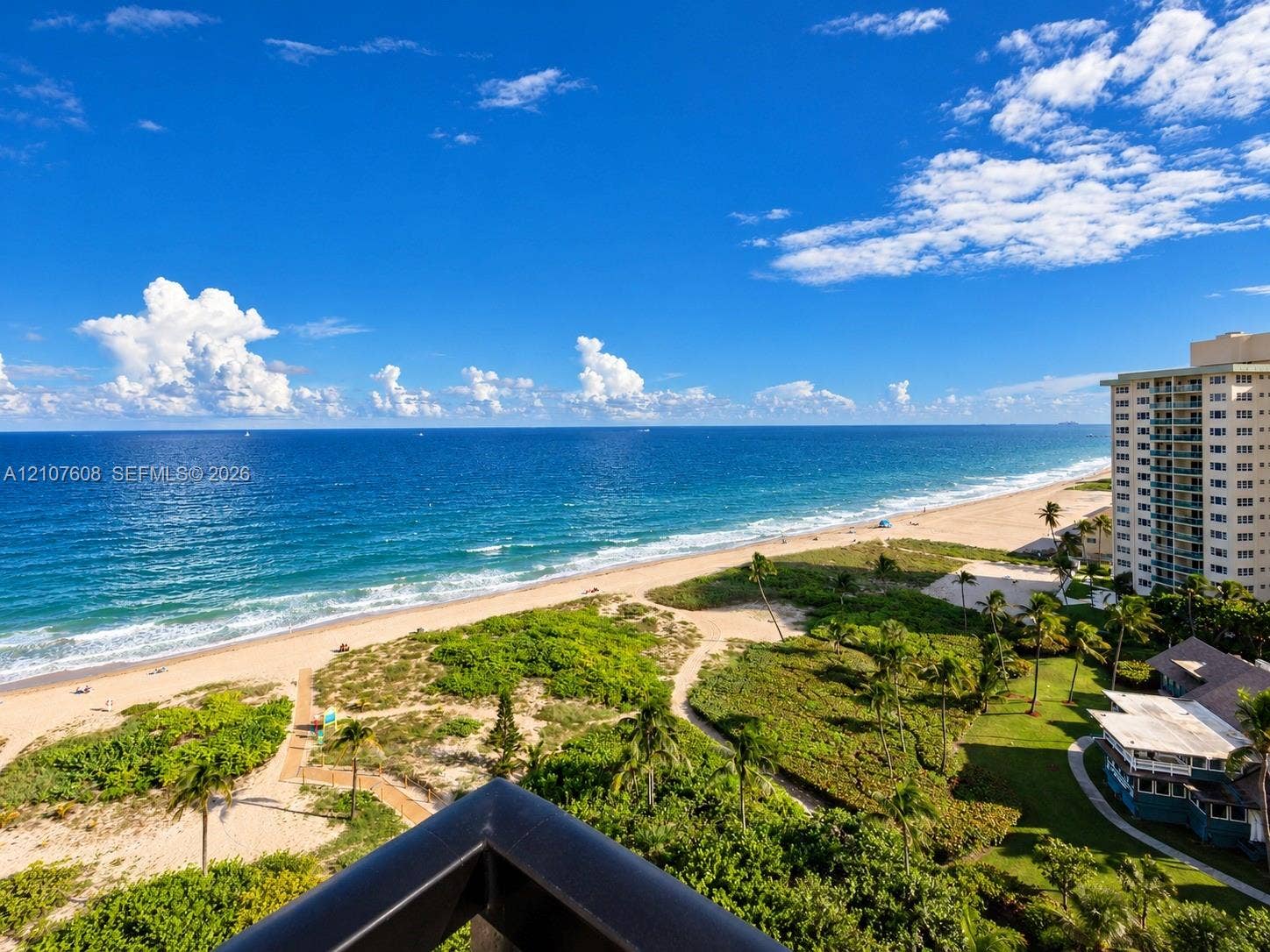 2000 S Ocean Boulevard, #12F, Lauderdale-By-The-Sea, Lauderdale By The Sea, FL 33062 Private balcony featuring oceanfront positioning with expansive coastal scenery, sandy beach access, and native landscaping