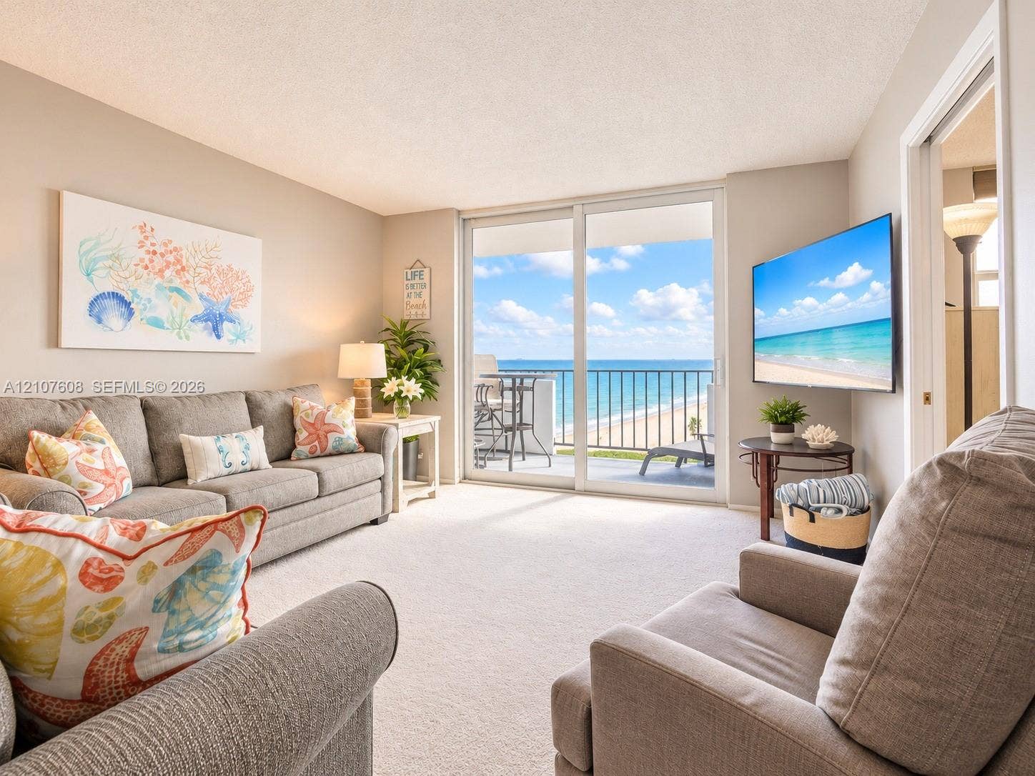 2000 S Ocean Boulevard, #12F, Lauderdale-By-The-Sea, Lauderdale By The Sea, FL 33062 Sliding glass doors providing access to a private balcony with ocean frontage