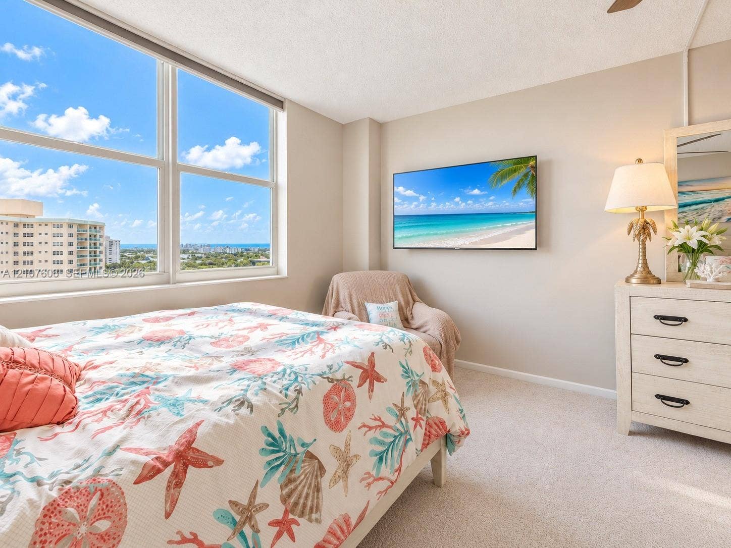 2000 S Ocean Boulevard, #12F, Lauderdale-By-The-Sea, Lauderdale By The Sea, FL 33062 Large-format windows featuring expansive exterior scenery, neutral wall tones, and wall-to-wall carpeting