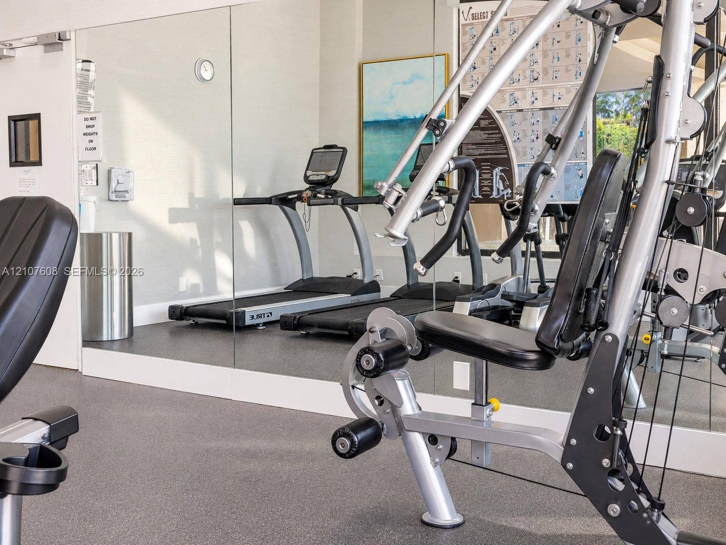 2000 S Ocean Boulevard, #12F, Lauderdale-By-The-Sea, Lauderdale By The Sea, FL 33062 Fitness center featuring wall-to-wall mirrors and durable rubberized flooring