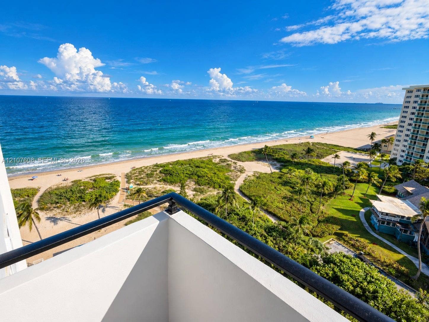 2000 S Ocean Boulevard, #12F, Lauderdale-By-The-Sea, Lauderdale By The Sea, FL 33062 Balcony featuring a black metal railing and expansive coastal scenery