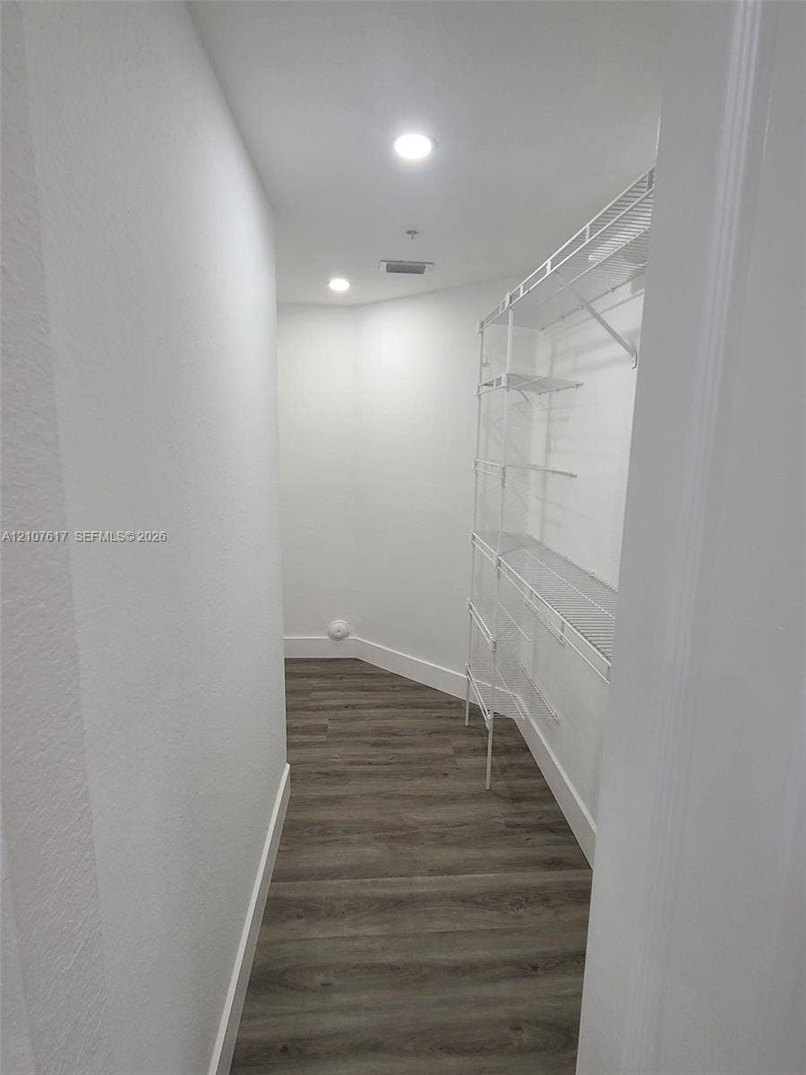 17415 NW 75th Place, #103, Hialeah, Hialeah, FL 33015 Walk-in storage space featuring wood-finish flooring and integrated white wire shelving