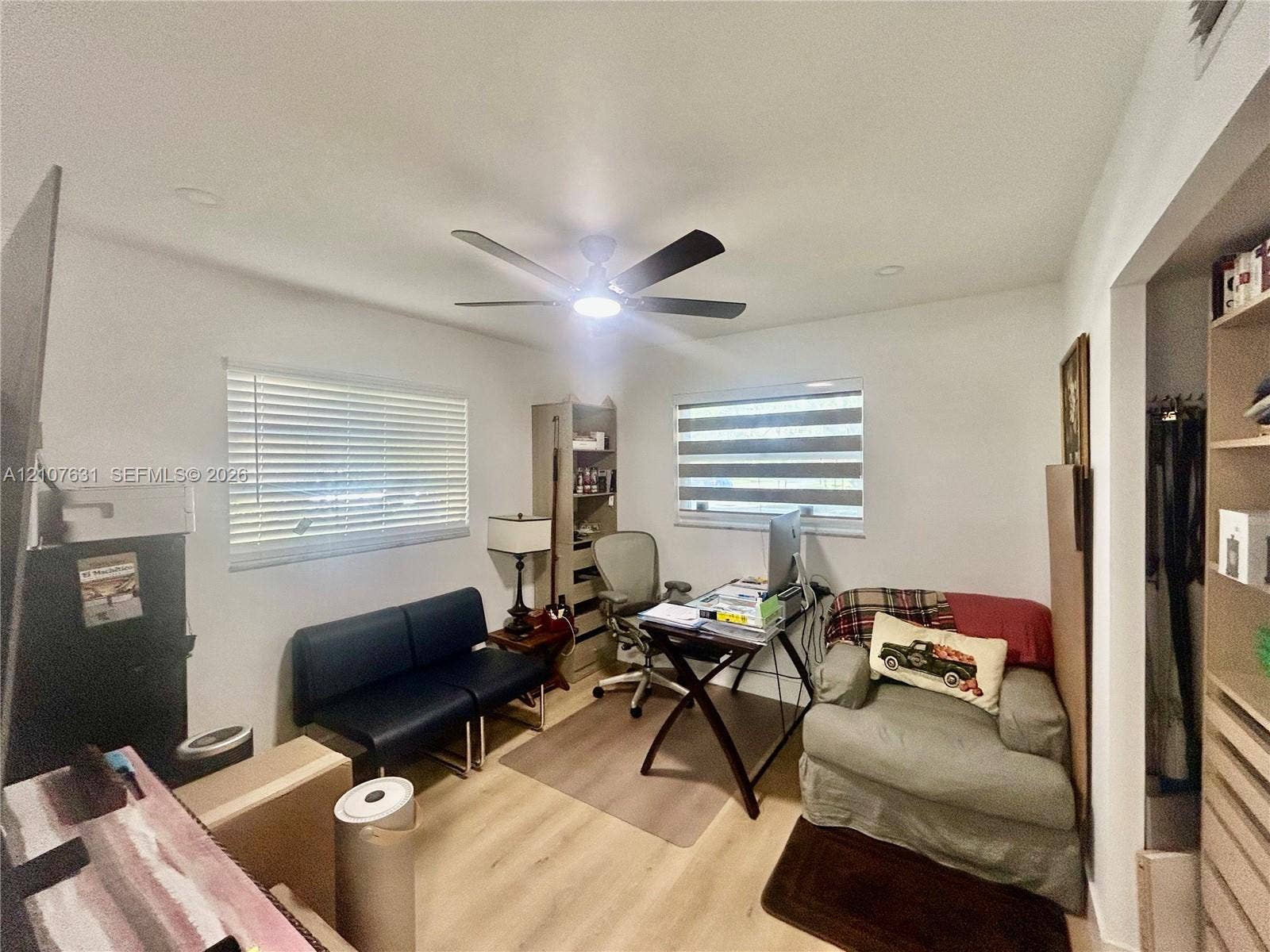 151 Berkley Road, #112, Hollywood, FL 33024 Room featuring wood-finish flooring, recessed lighting, a ceiling fan, and built-in closet shelving