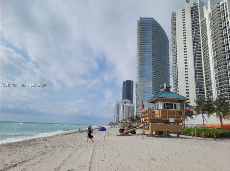 19201 Collins Avenue, #941, Sunny Isles Beach, FL 33160 Coastal property featuring direct beach access, sand shoreline, and expansive ocean frontage