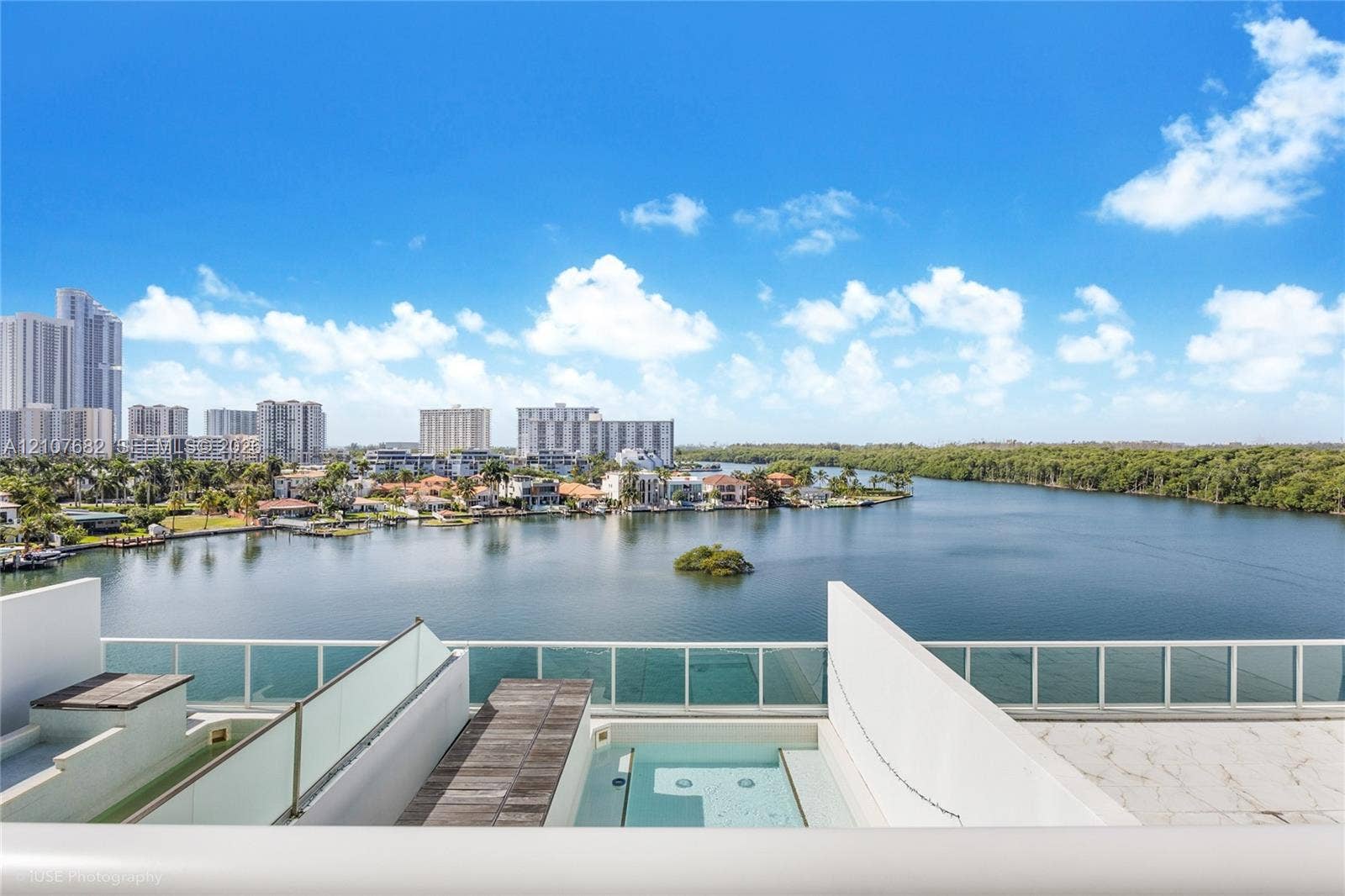 400 Sunny Isles Boulevard, #704, Sunny Isles Beach, Sunny Isles Beach, FL 33160 Private terrace featuring a built-in plunge pool, wood-finish decking, and tempered glass railings overlooking the waterfront