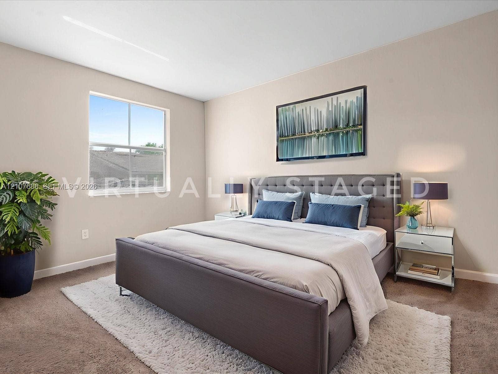 1677 SE 27th Court, #202, Homestead, FL 33035 Neutral-toned walls, carpeting, and a single-pane window with natural light exposure