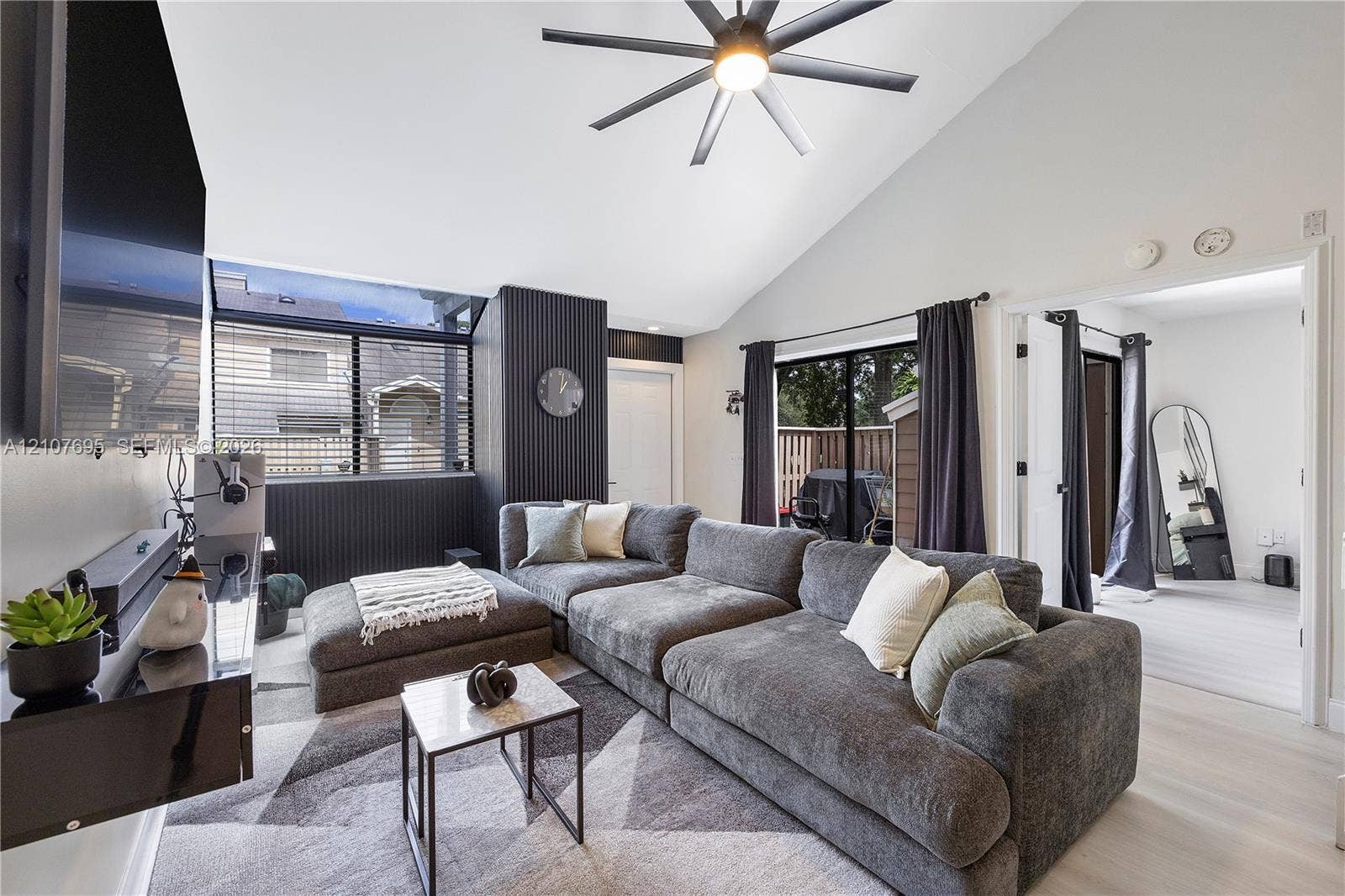 7198 Sportsmans Drive, North Lauderdale, FL 33068 Vaulted ceiling featuring a central multi-blade ceiling fan