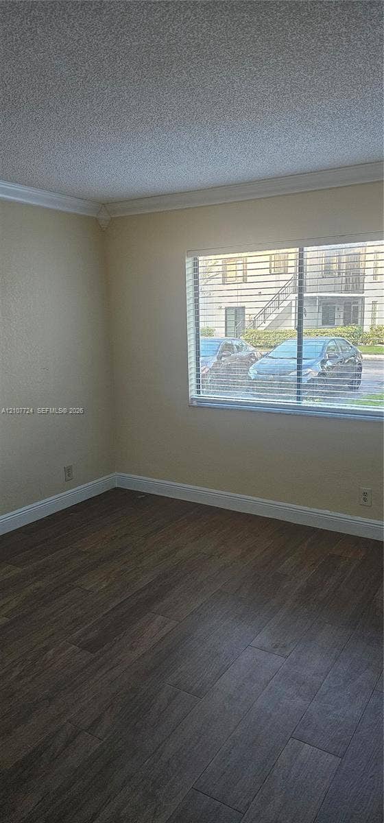 280 Racquet Club Road, #103, Weston, Weston, FL 33326 Interior space featuring wood-finish flooring, crown molding, and horizontal slat window blinds