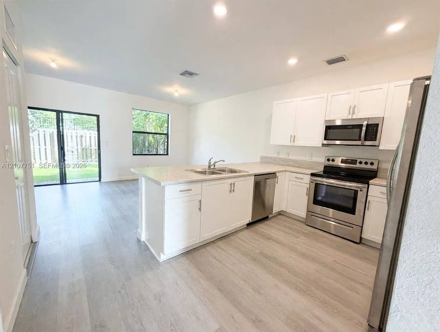 Property photo for 713 NE 208th Terrace, Miami, FL