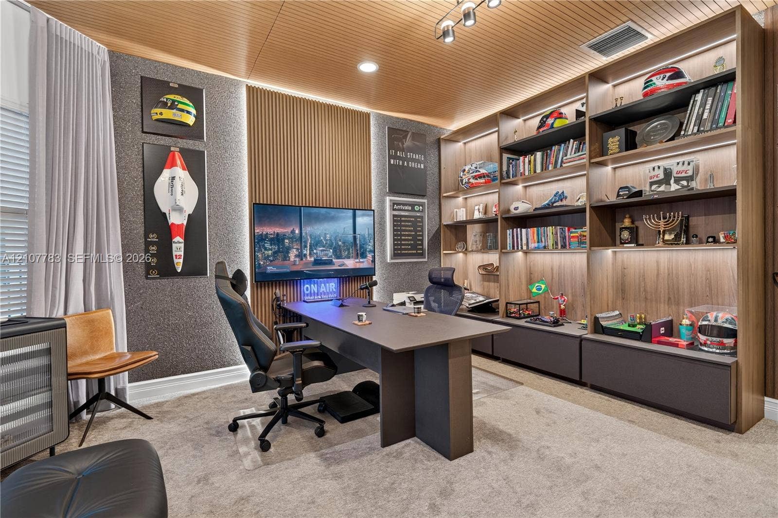 9328 Tropez Lane, Delray Beach, FL 33446 Custom floor-to-ceiling wooden shelving with integrated LED display lighting, slat-wood ceiling detail, vertical wall paneling, and wall-mounted track lighting