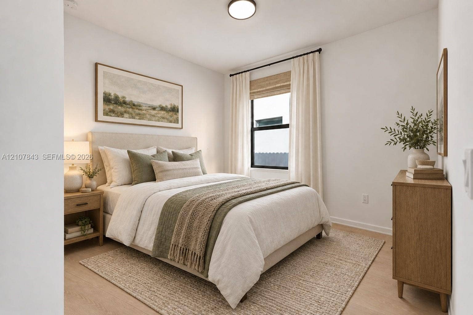 4949 Blistering Way, Lake Worth, FL 33467 Neutral-toned room featuring wood-finish flooring, a single-pane window with black framing, and a flush-mount overhead light fixture
