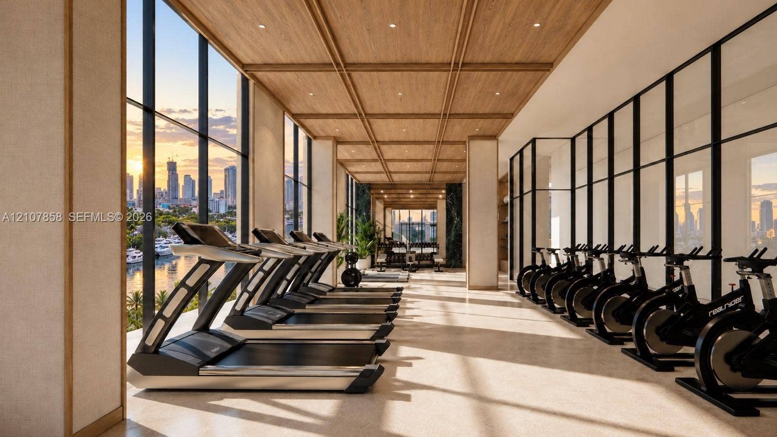 555 S River Drive, #506, Miami, FL 33136 Fitness center featuring floor-to-ceiling windows, wood-paneled coffered ceilings, recessed lighting, and stone-finish flooring