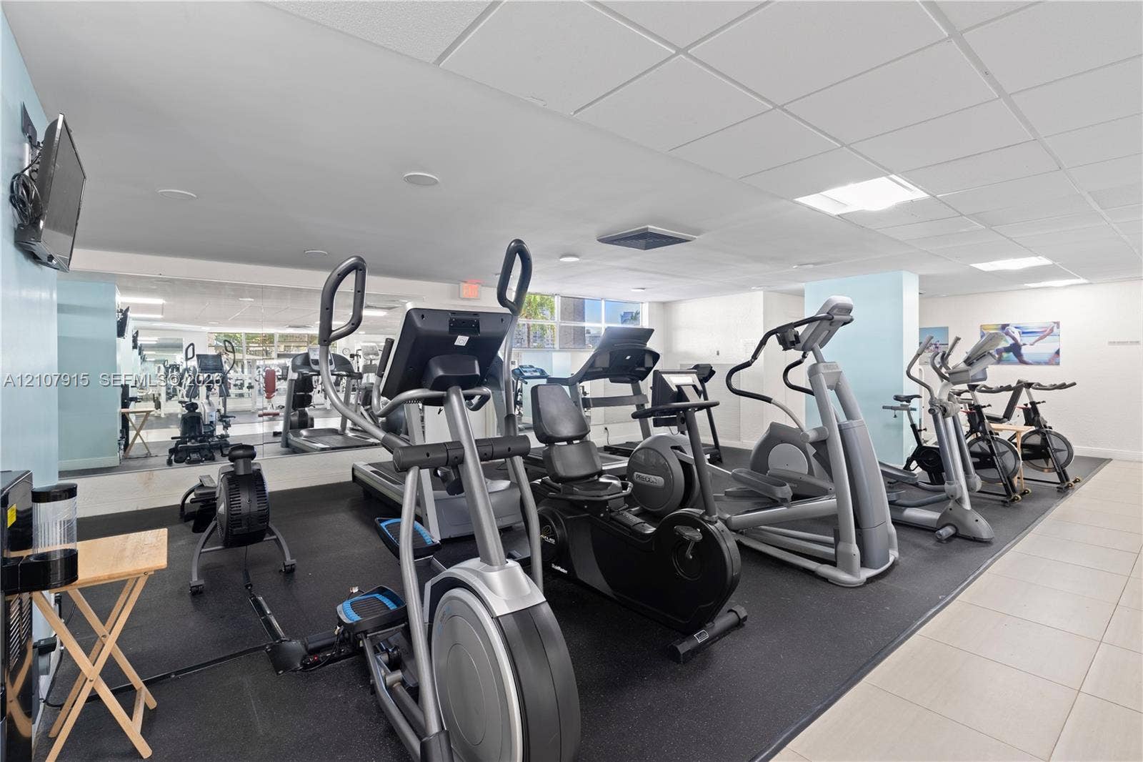 400 Leslie Drive, #622, Hallandale Beach, Hallandale Beach, FL 33009 Fitness center featuring rubberized flooring, expansive wall-to-wall mirrors, recessed lighting, and large windows