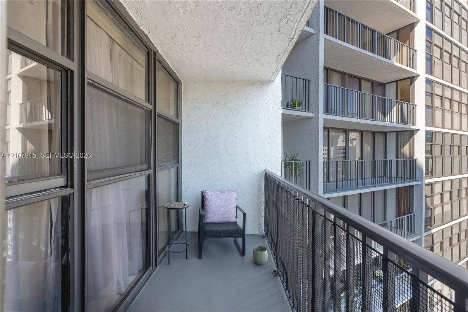 400 Leslie Drive, #622, Hallandale Beach, Hallandale Beach, FL 33009 Private balcony featuring a concrete floor, textured stucco wall, and metal safety railing