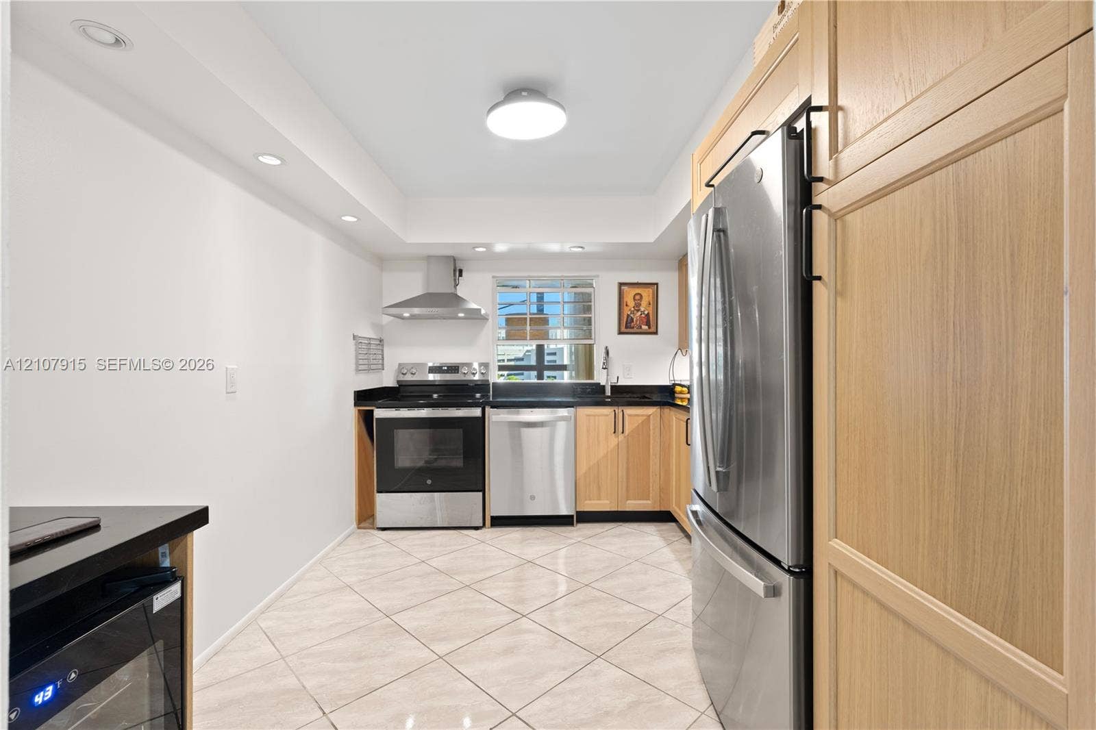 400 Leslie Drive, #622, Hallandale Beach, Hallandale Beach, FL 33009 Kitchen featuring light-finish wood cabinetry, stainless steel appliances, dark stone countertops, tile flooring, and recessed ceiling lighting