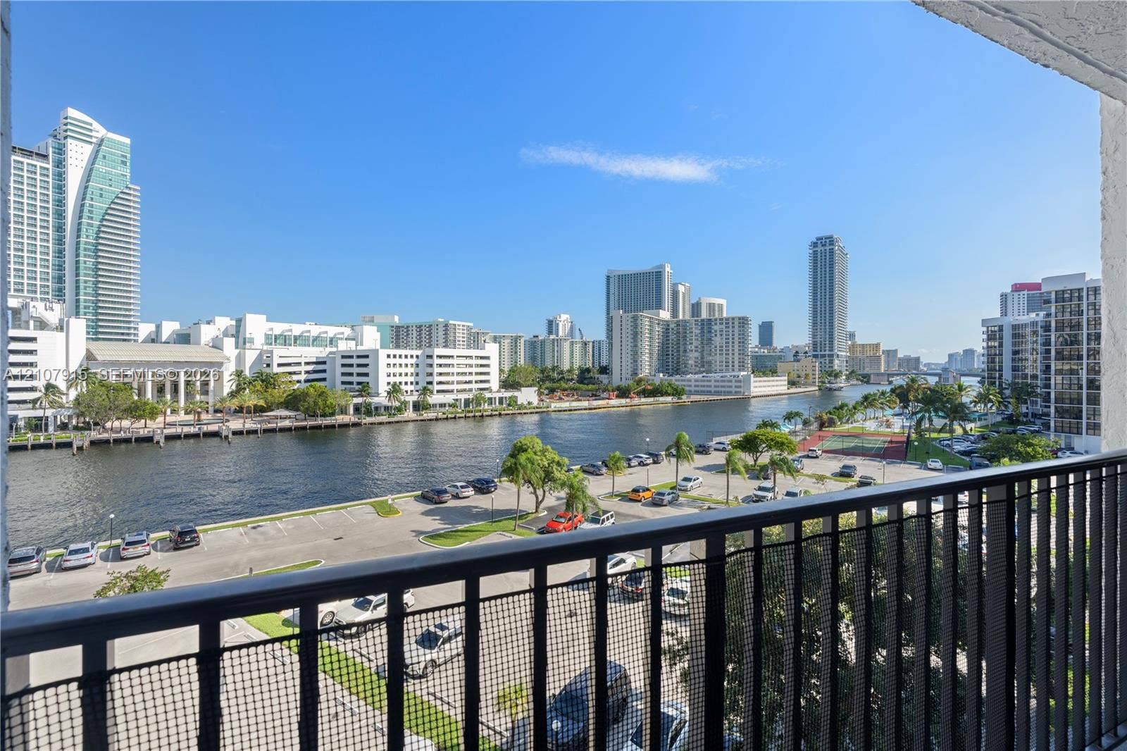 400 Leslie Drive, #622, Hallandale Beach, Hallandale Beach, FL 33009 Covered private balcony featuring black metal railings and direct water and urban skyline scenery