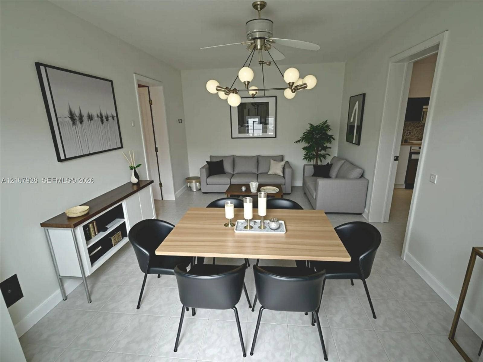 815 Foster Road, #2, Hallandale Beach, Hallandale Beach, FL 33009 Multi-bulb modern chandelier, neutral tile flooring, and built-in white cabinetry with a wood-finish top