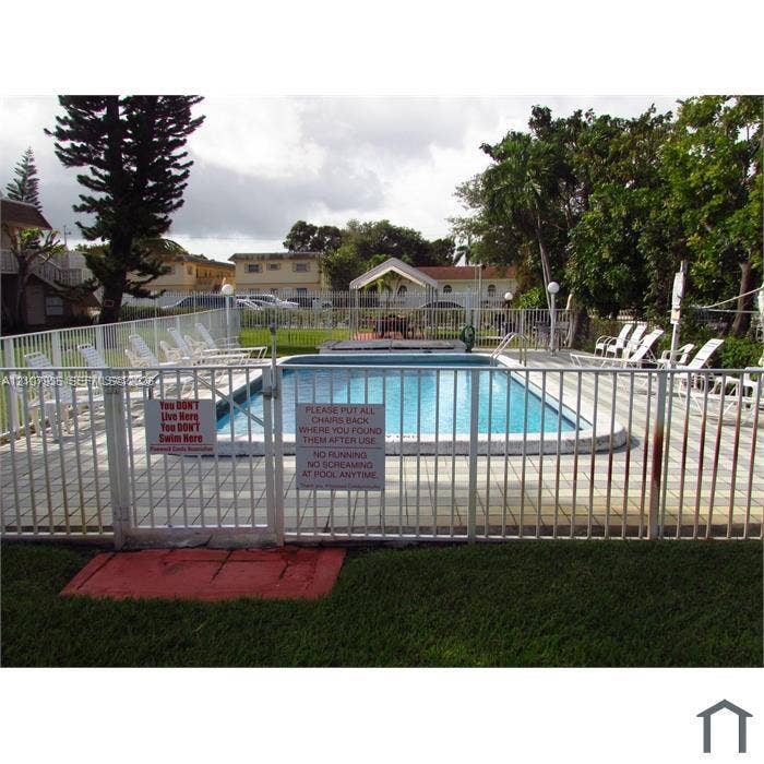 2839 Taylor Street, #3, Hollywood, Hollywood, FL 33020 In-ground swimming pool featuring a concrete paver deck and metal perimeter fencing