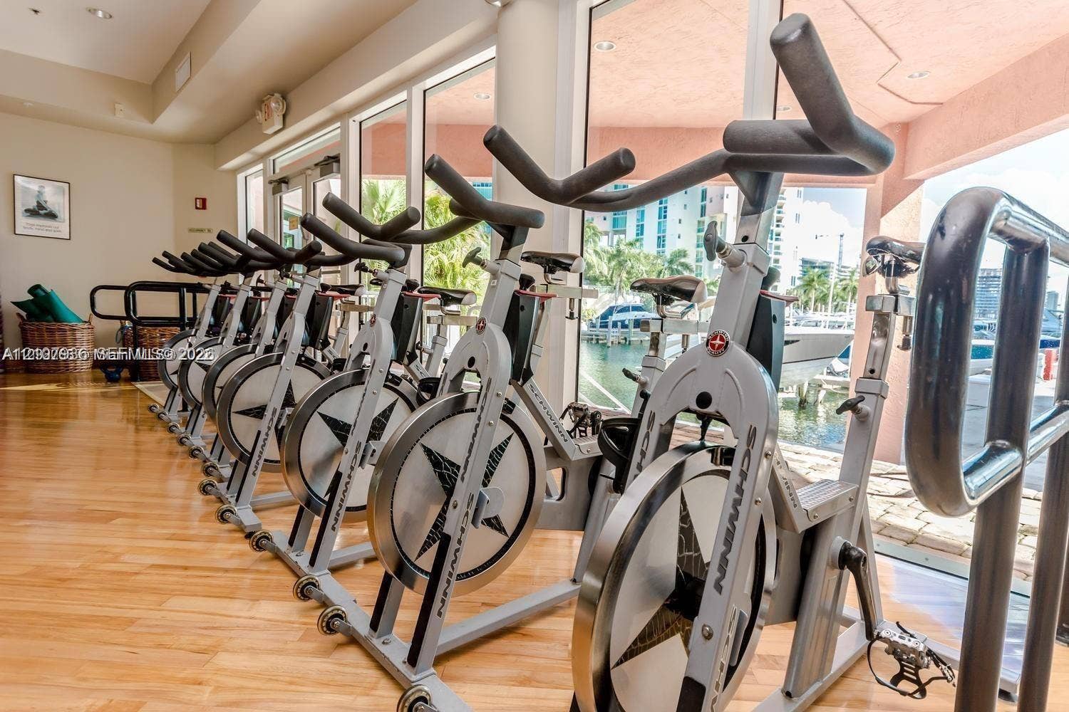 3370 Hidden Bay Drive, #510, Aventura, FL 33180 Fitness center featuring wood-finish flooring, floor-to-ceiling windows, and recessed lighting