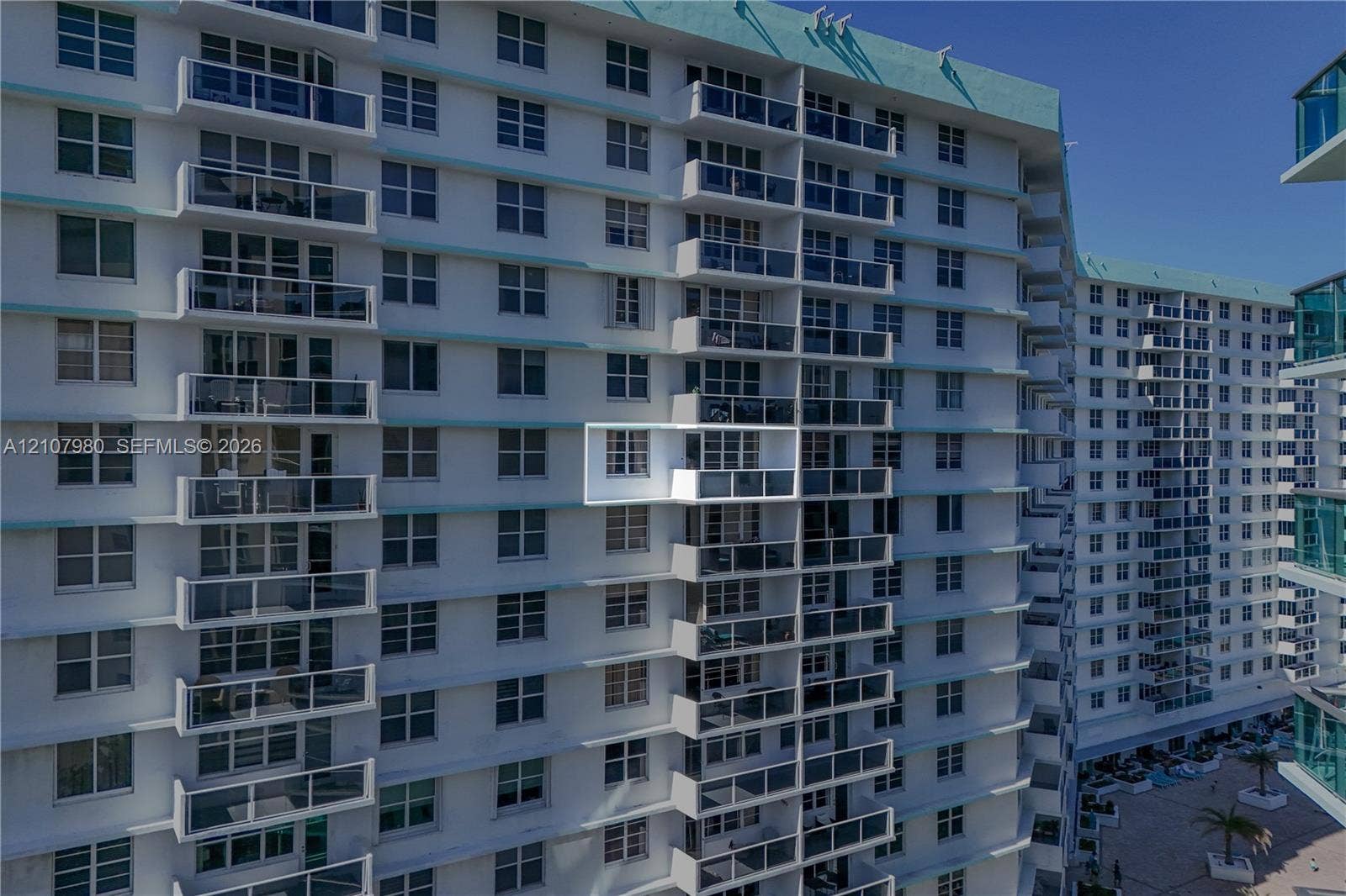 3725 S Ocean Drive, #1120, Hollywood, Hollywood, FL 33019 High-rise exterior featuring individual balconies with glass railings and white concrete structural facade