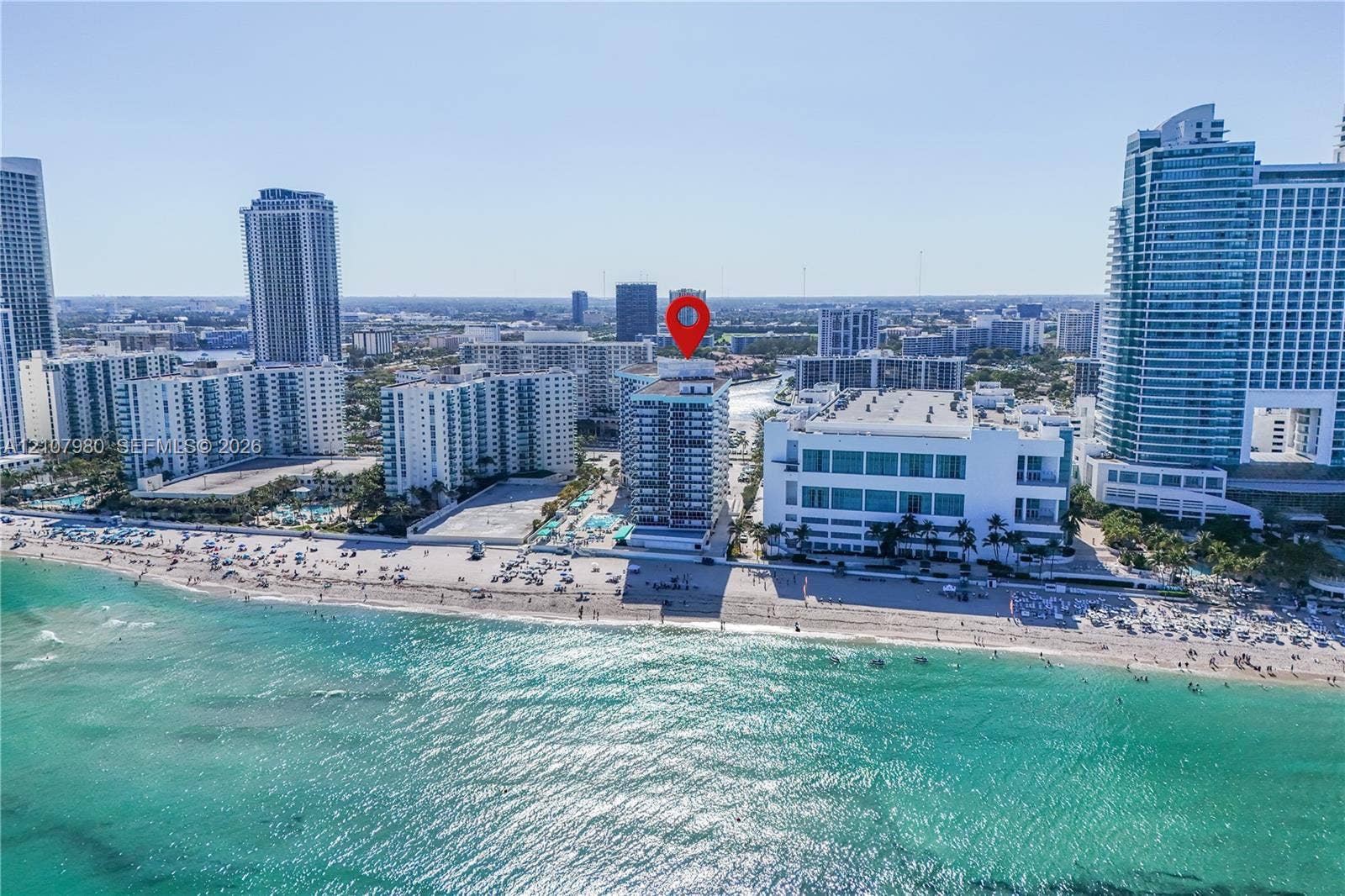 3725 S Ocean Drive, #1120, Hollywood, Hollywood, FL 33019 High-rise condominium exterior located directly on the coastline, featuring prominent ocean frontage and proximity to sandy beaches
