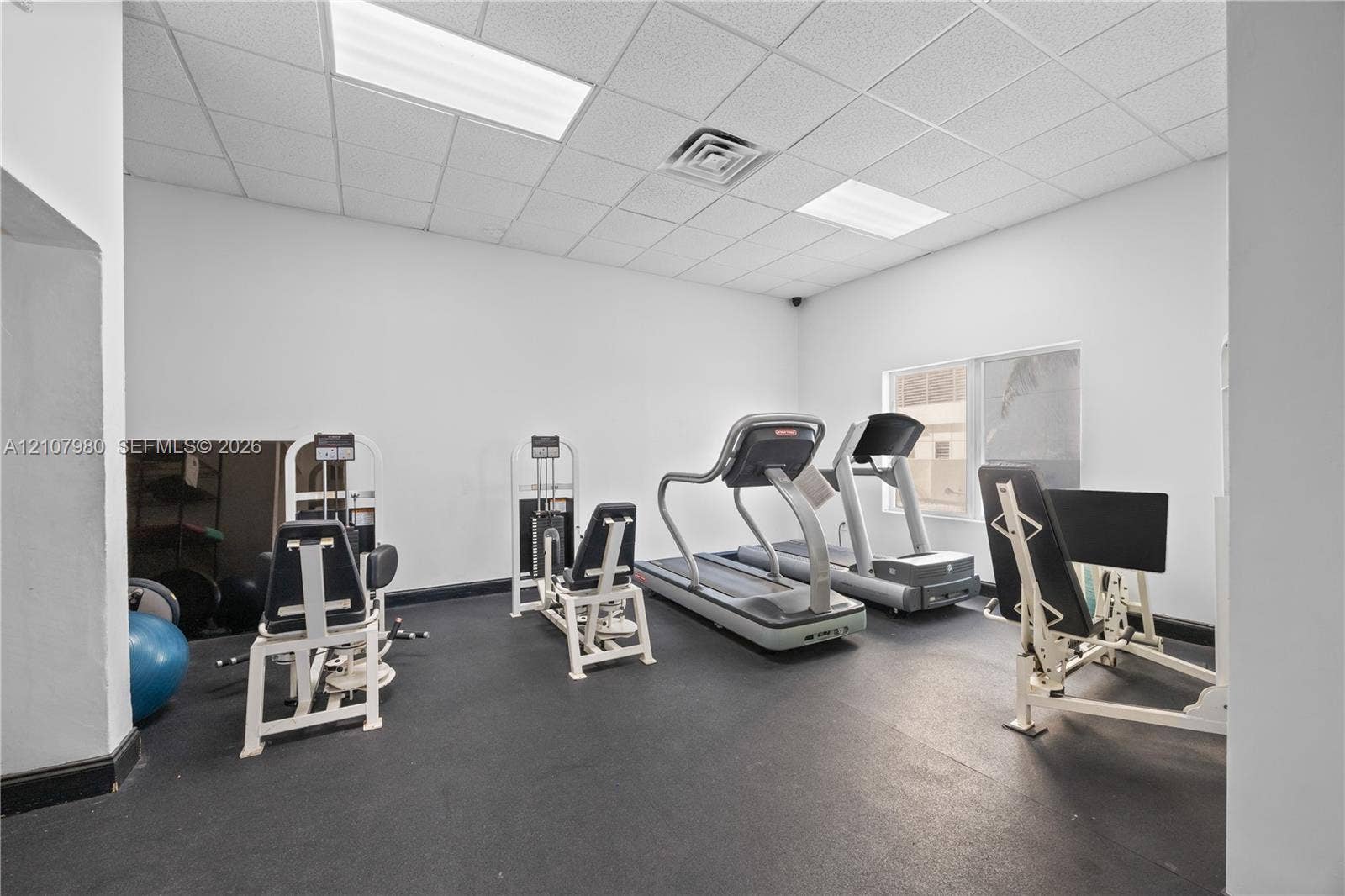 3725 S Ocean Drive, #1120, Hollywood, Hollywood, FL 33019 Fitness area featuring rubber flooring, recessed drop-ceiling tiles, and inset rectangular lighting
