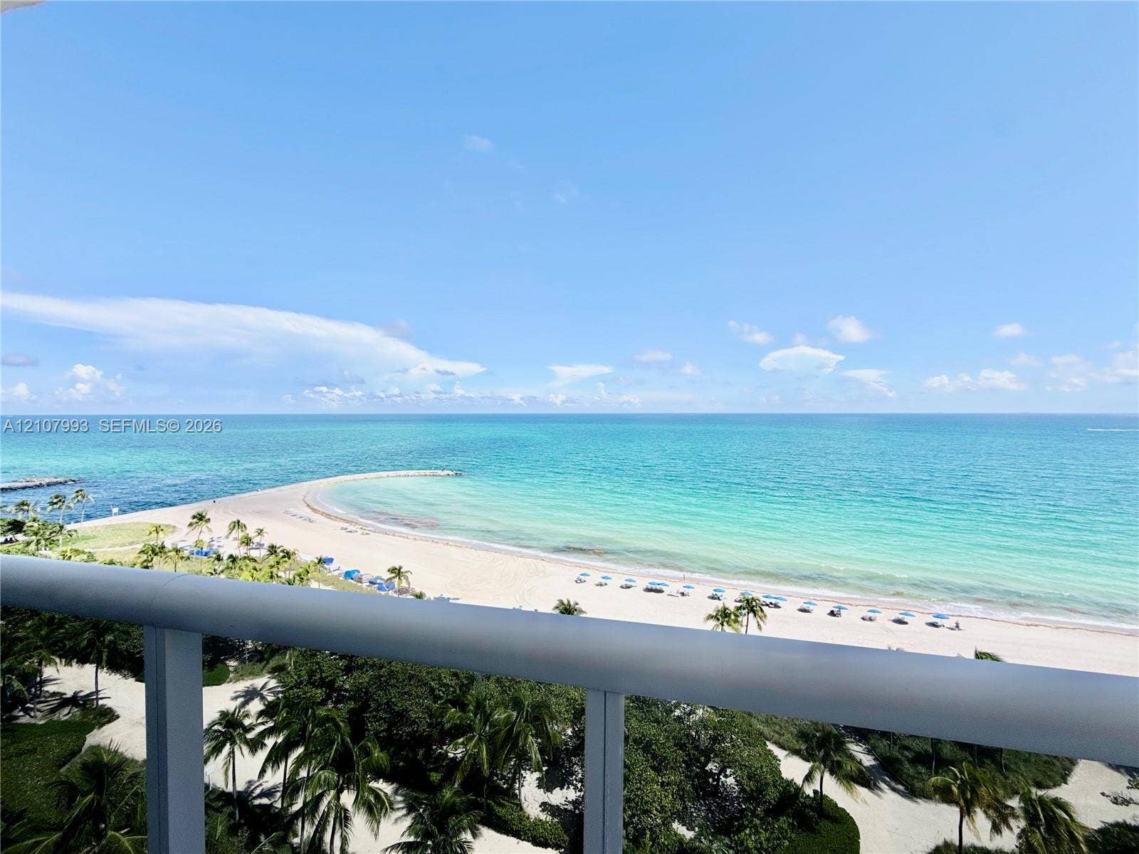 10275 Collins Avenue, #1110, Bal Harbour, Bal Harbour, FL 33154 Private balcony with a metal railing overlooking the oceanfront and sandy beach