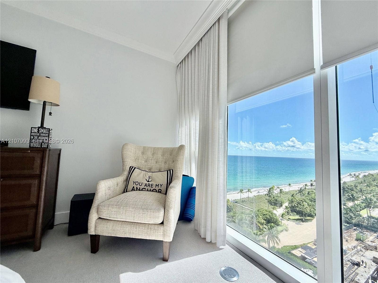 10275 Collins Avenue, #1110, Bal Harbour, Bal Harbour, FL 33154 Floor-to-ceiling windows featuring automated roller shades, crown molding, and ocean scenery