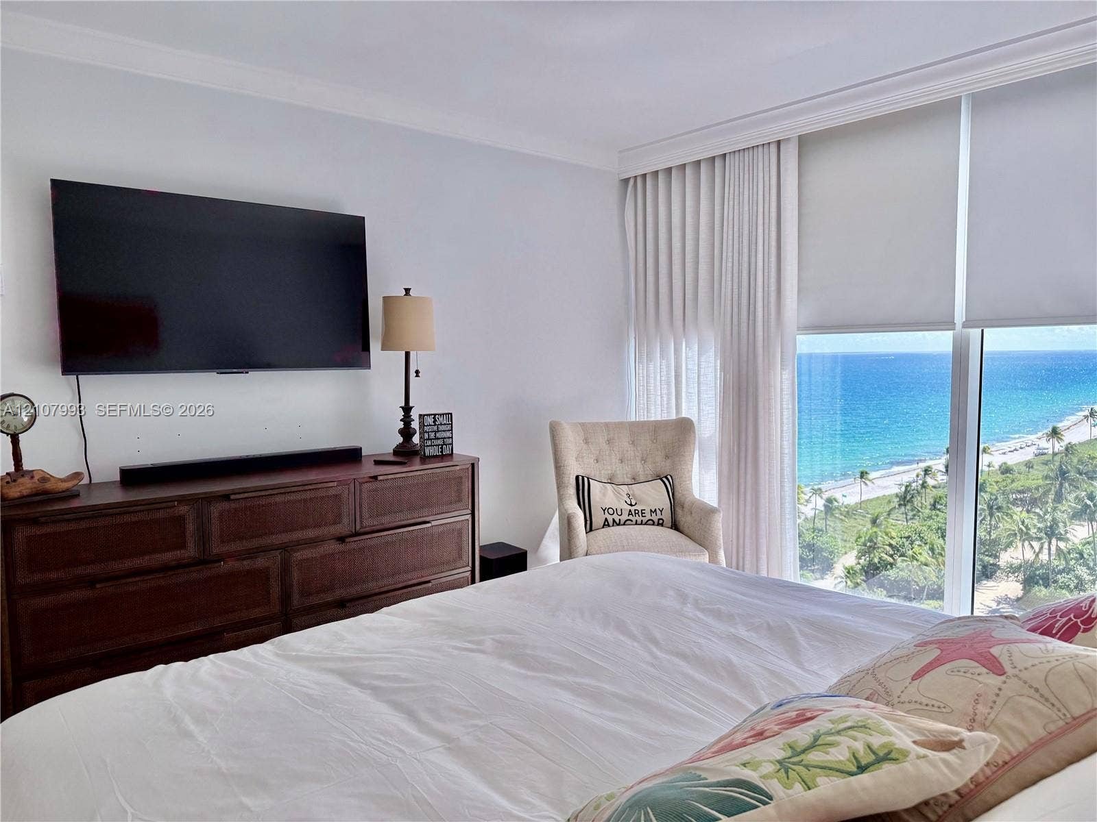 10275 Collins Avenue, #1110, Bal Harbour, Bal Harbour, FL 33154 Floor-to-ceiling windows featuring ocean scenery, crown molding, and retractable privacy shades