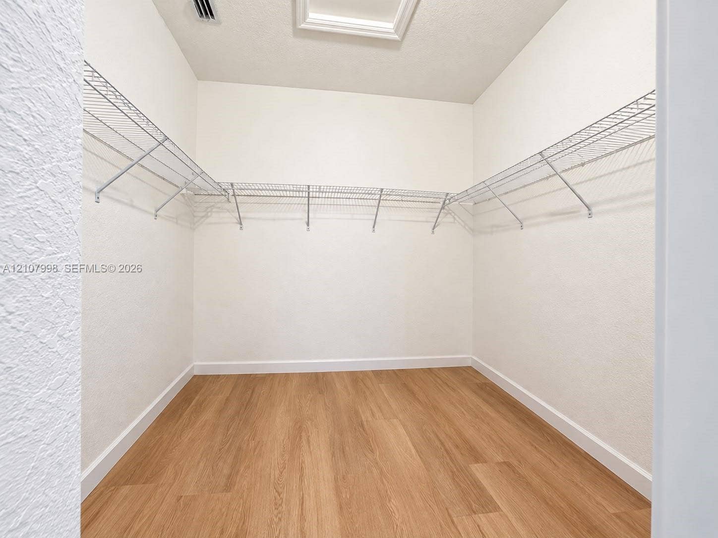 23471 SW 129th Avenue, Homestead, Homestead, FL 33032 Storage space featuring wood-finish flooring and integrated wire shelving