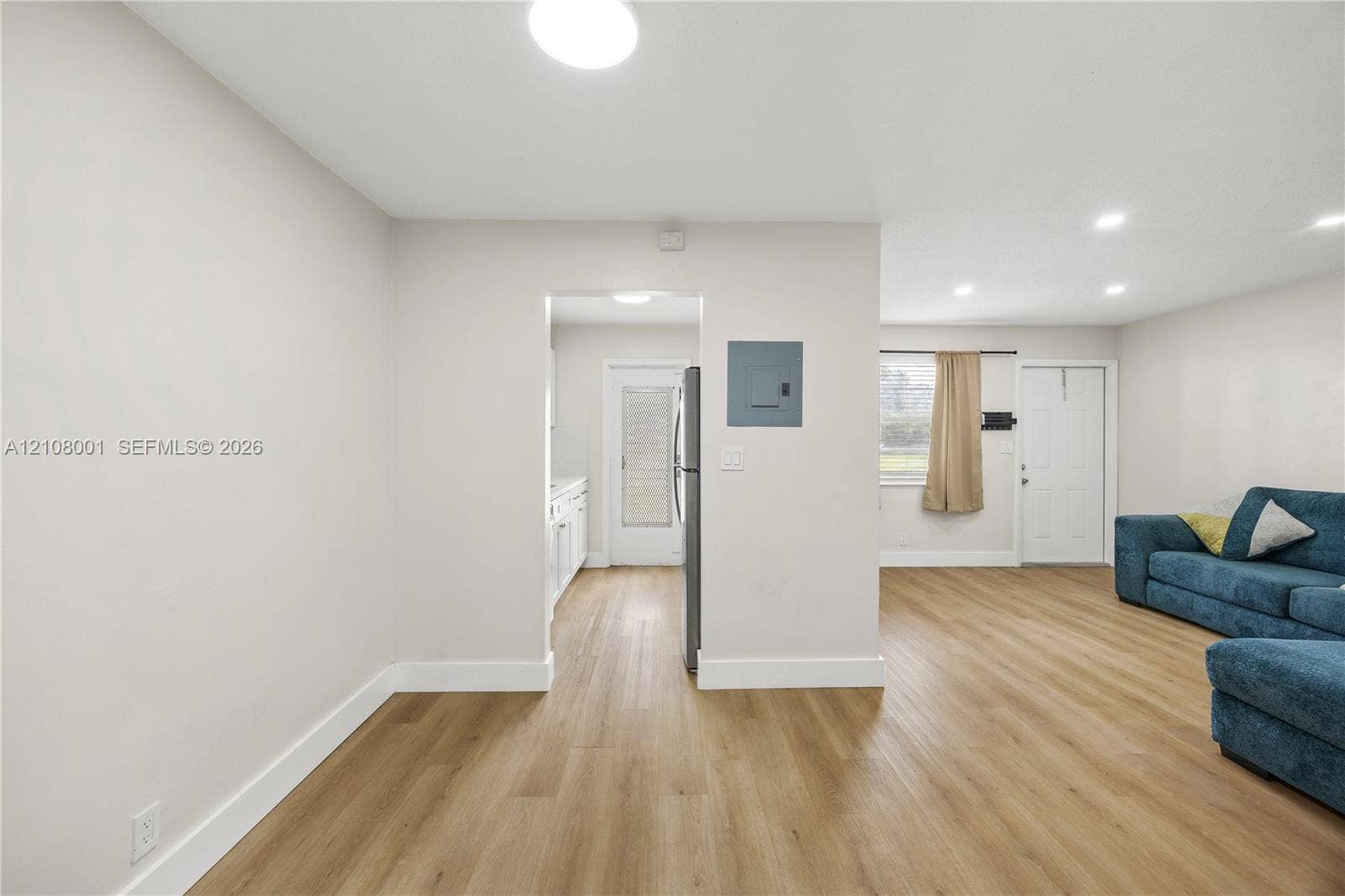 2418 Polk Street, #105, Hollywood, Hollywood, FL 33020 Interior space featuring wood-finish flooring, neutral wall paint, and recessed lighting throughout