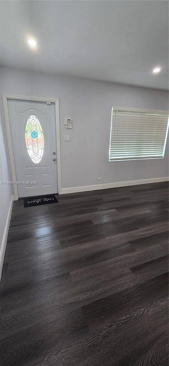 7176 SW 12th Street, #7176, Miami, Miami, FL 33144 Entryway featuring wood-finish flooring, recessed lighting, and an exterior door with an oval stained-glass insert