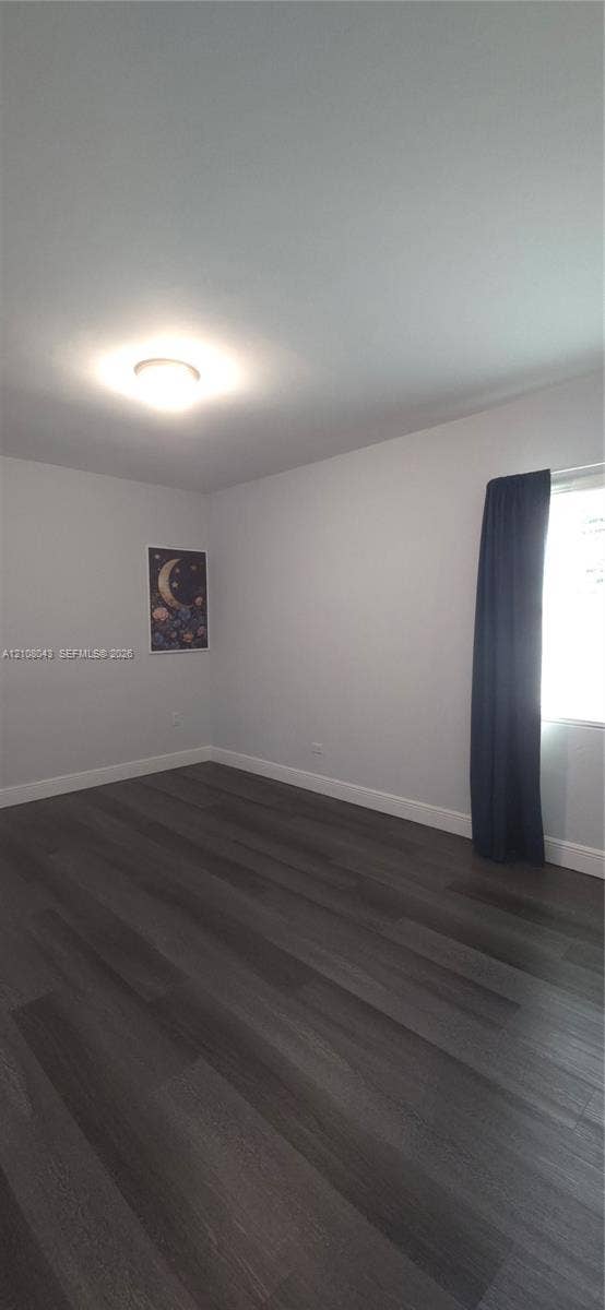 7176 SW 12th Street, #7176, Miami, Miami, FL 33144 Neutral-toned walls, wood-finish flooring, and flush-mount ceiling lighting