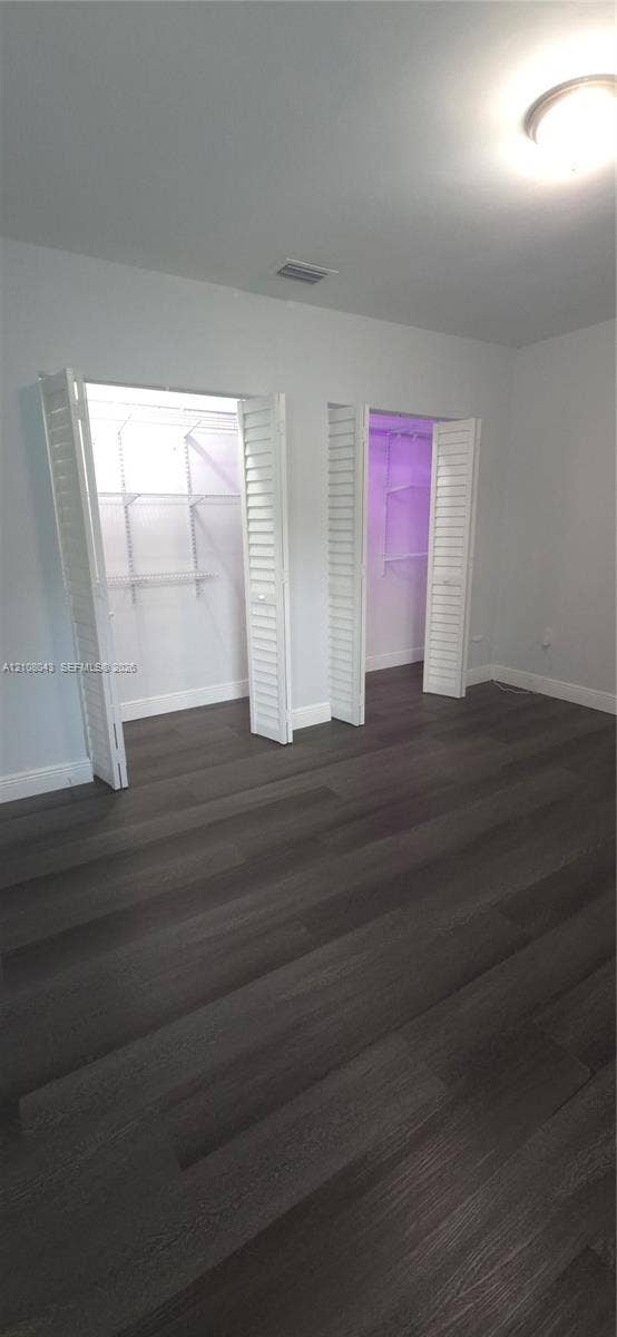 7176 SW 12th Street, #7176, Miami, Miami, FL 33144 Wood-finish flooring, dual closets with louvered doors, and built-in wire shelving
