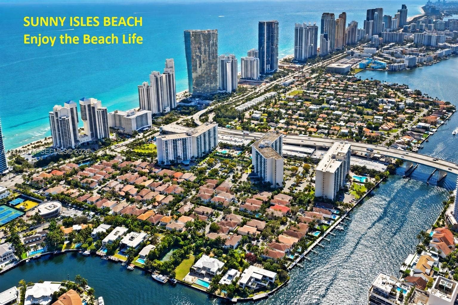 250 180th Drive, #202, Sunny Isles Beach, Sunny Isles Beach, FL 33160 Aerial perspective of Sunny Isles Beach featuring coastal shoreline, high-rise architecture, residential development, inland waterways