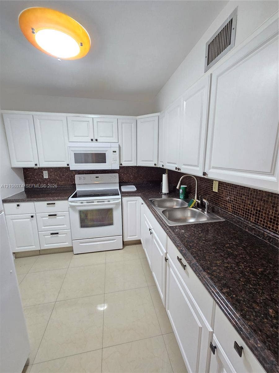 250 180th Drive, #202, Sunny Isles Beach, Sunny Isles Beach, FL 33160 Updated kitchen. Marble countertop