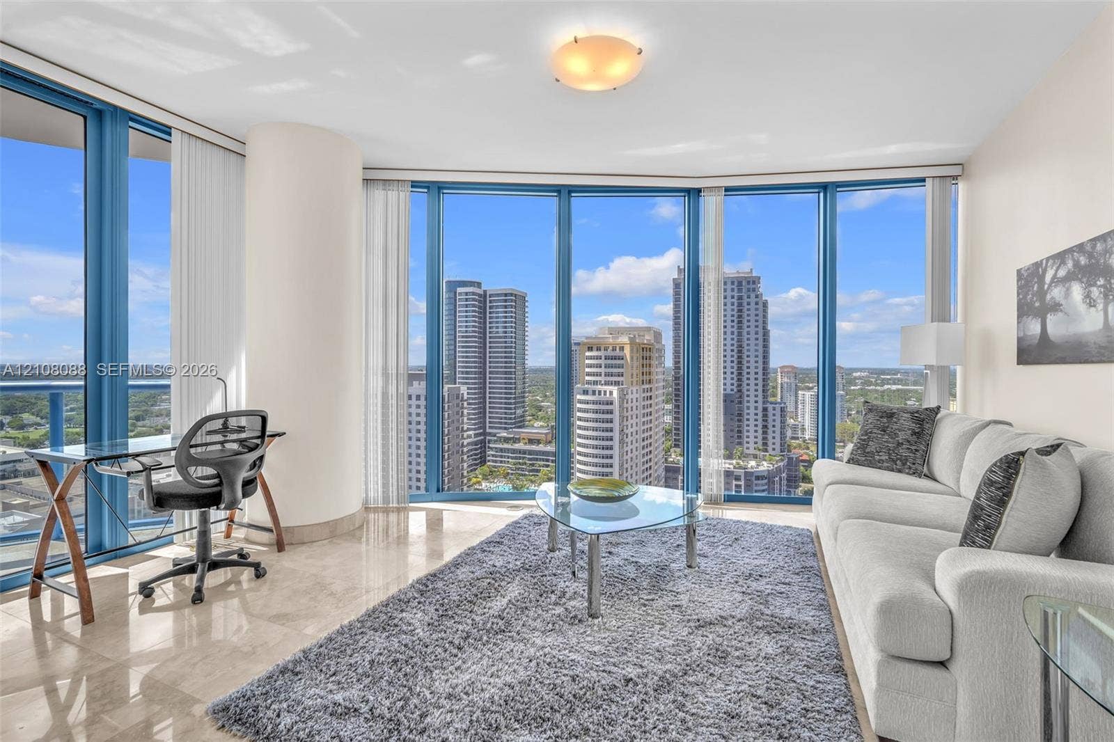 333 Las Olas Way, #2601, Fort Lauderdale, FL 33301 Floor-to-ceiling windows, polished stone flooring, and structural column