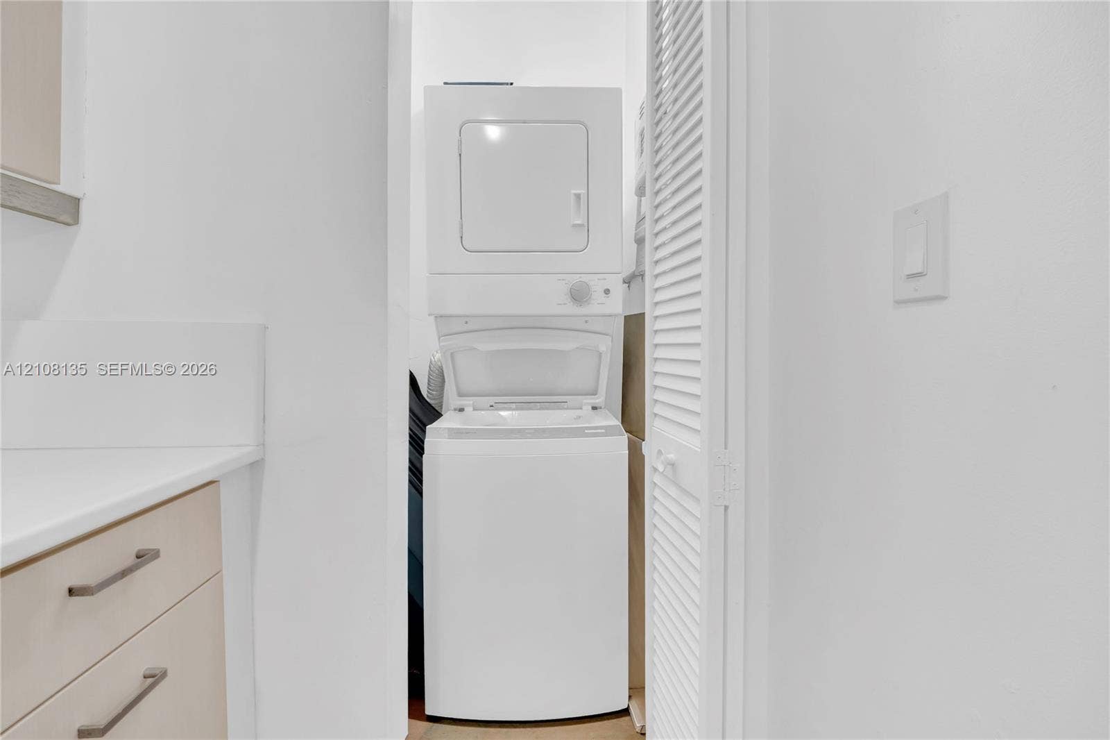 Stacked laundry in unit