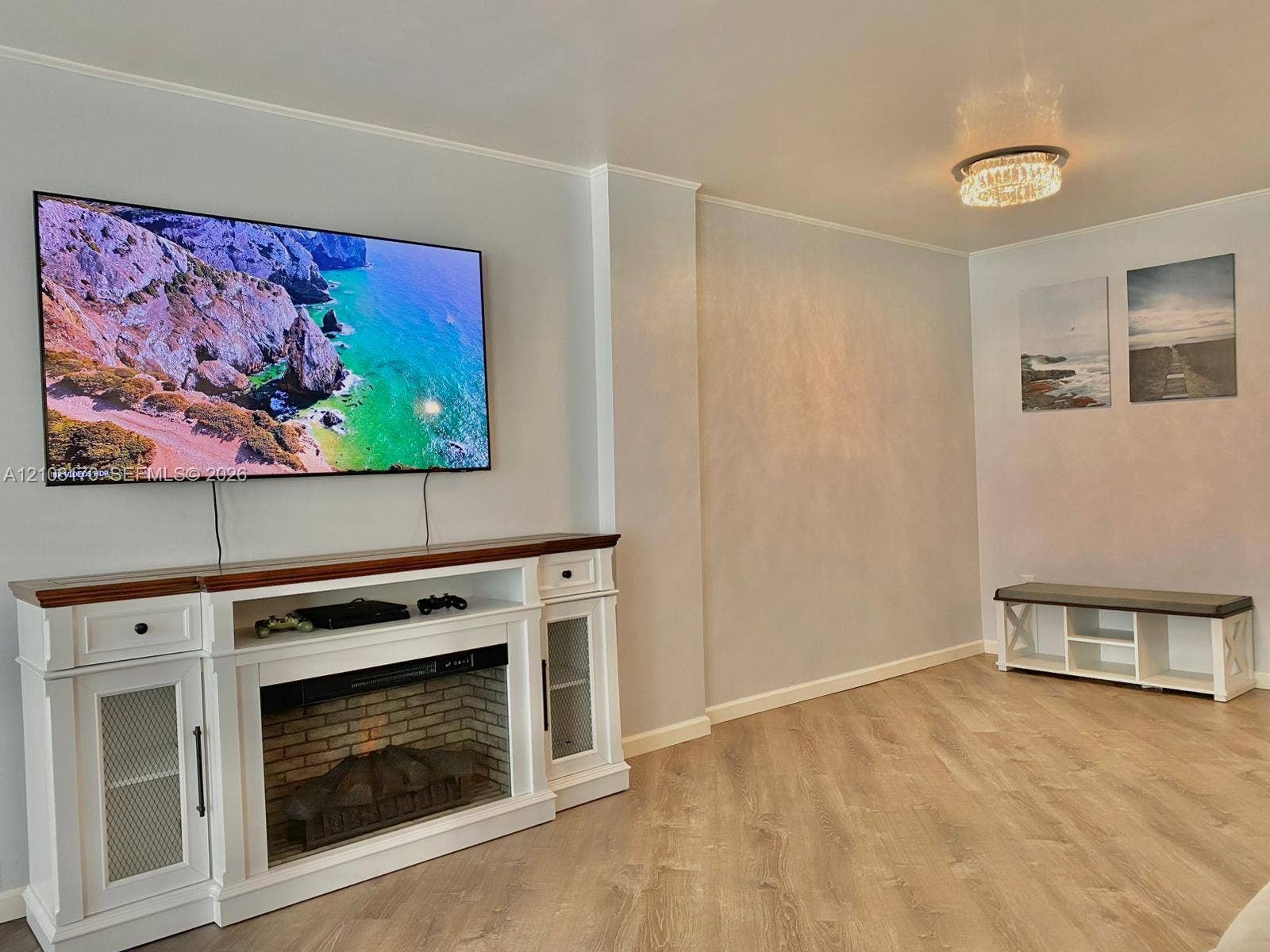 801 Three Islands Boulevard, #108, Hallandale Beach, FL 33009 Living Room Fireplace