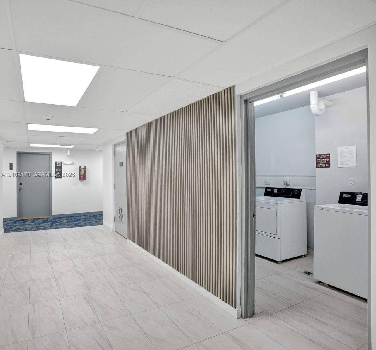 801 Three Islands Boulevard, #108, Hallandale Beach, FL 33009 Laundry, Elevator Landing