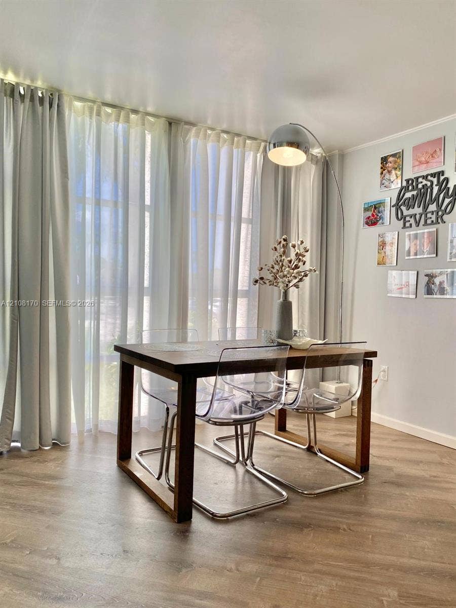 801 Three Islands Boulevard, #108, Hallandale Beach, FL 33009 Dining Area, Floor-to-ceiling Windows