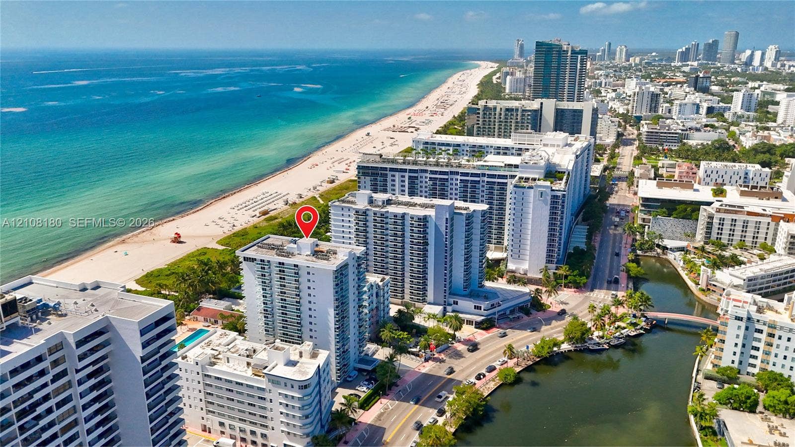 2457 Collins Avenue, #1501, Miami Beach, FL 33140 High-rise property featuring a coastal location with immediate proximity to the Atlantic Ocean shoreline and local waterway