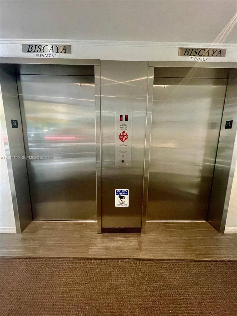 20400 W Country Club Drive, #608, Aventura, Aventura, FL 33180 Dual stainless steel elevator banks featuring polished metal finishes and integrated call panels