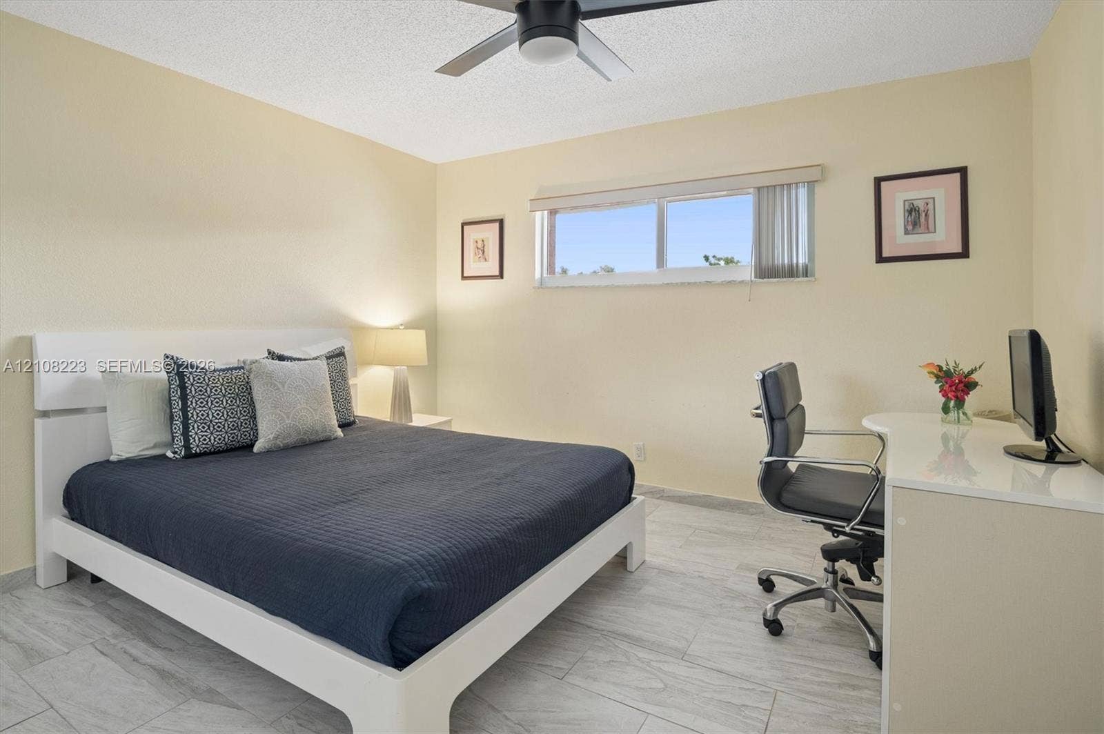 311 S Hollybrook Drive, #309, Pembroke Pines, FL 33025 Room featuring neutral wall paint, tile flooring, and a ceiling-mounted fan with integrated lighting