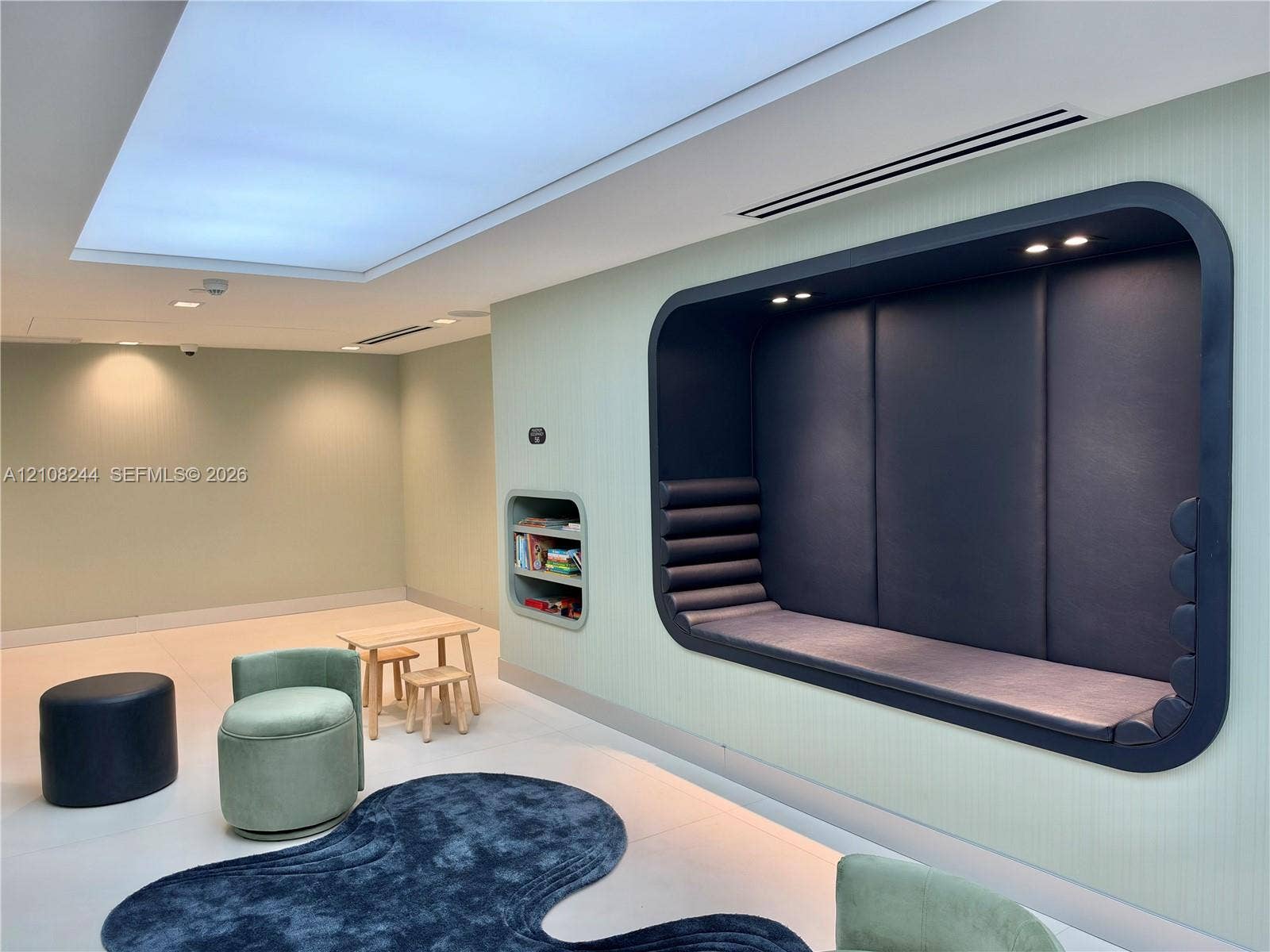 1170 Hallandale Beach Boulevard, #605, Hallandale Beach, Hallandale Beach, FL 33009 Large-format tile flooring, recessed linear lighting, and wall-mounted multimedia console